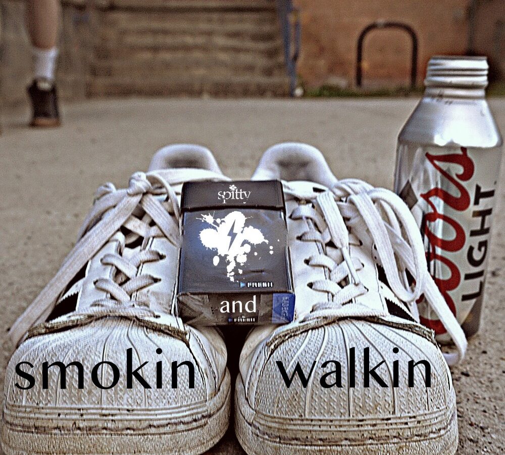 spitty the sequel is multitasking on “smokin and walking” single